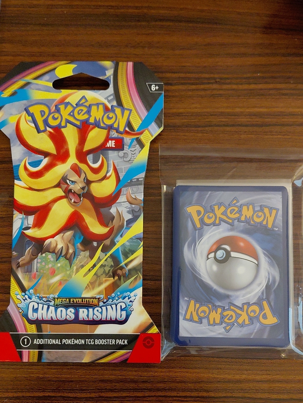 Pokémon TCG Mega Evolution Chaos Rising Booster Pack - Yellow & Red Artwork